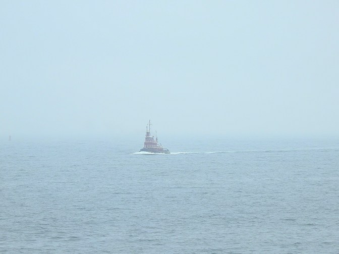 Tugboat underway in the waters of Maine off the coast of South Portland Maine